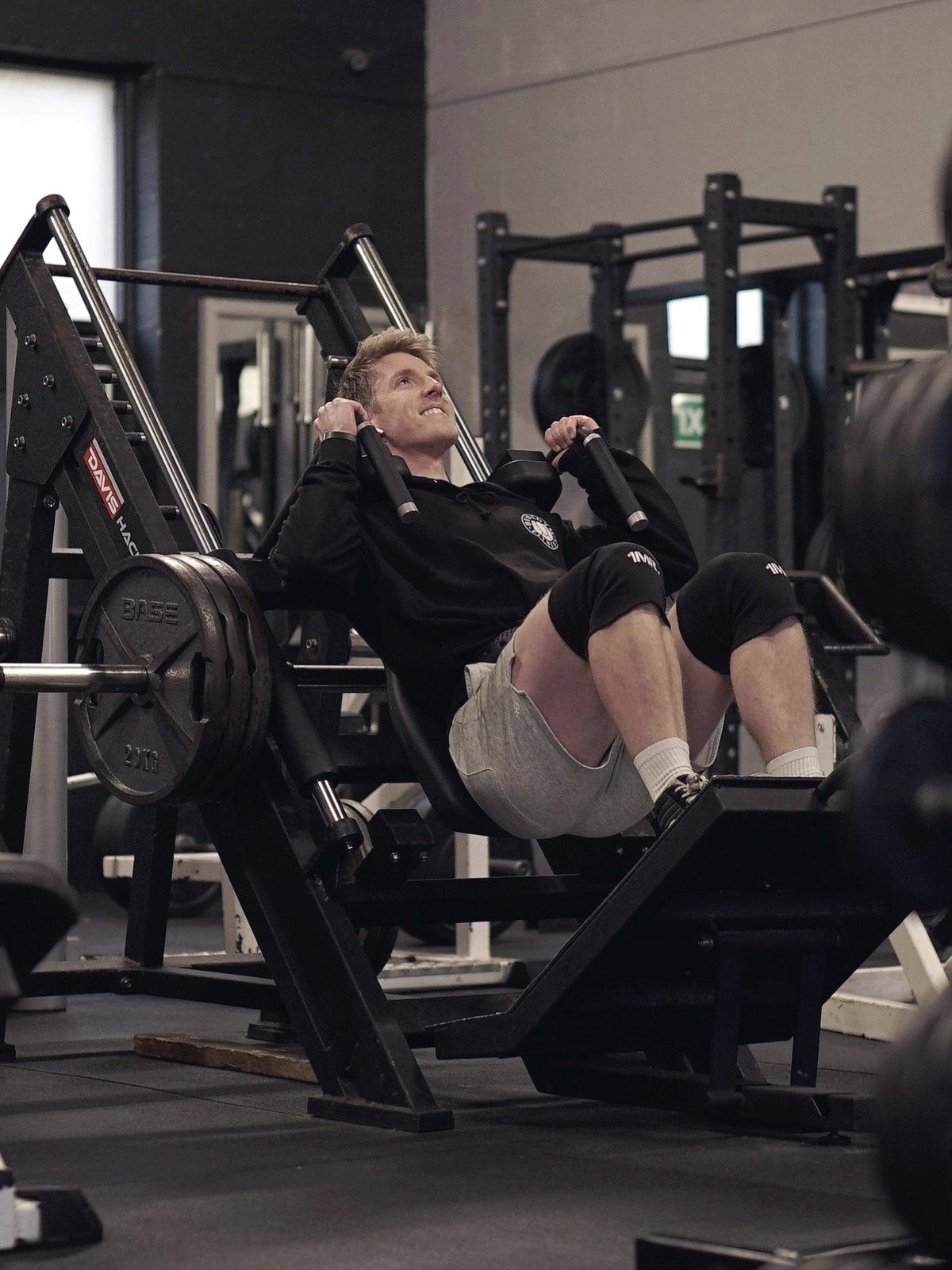 A member on the hack squat