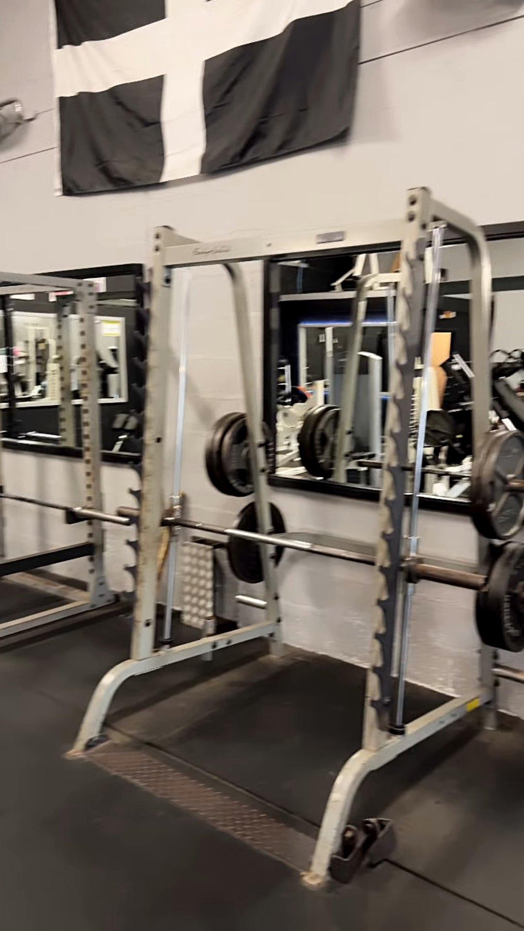 A Smith machine with the St Piran flag on the wall above